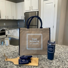 Find your perfect fit at The Pointe at Concord a branded bag, cup and coozies