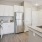 Well-lit kitchen with ample counter space